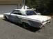 1964 Ford Fairlane - This vintage Ford Falcon is parked in front of a garage, showing signs of bodywork and custom exhaust.