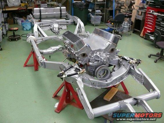 Corvette chassis with engine and drivetrain on stands