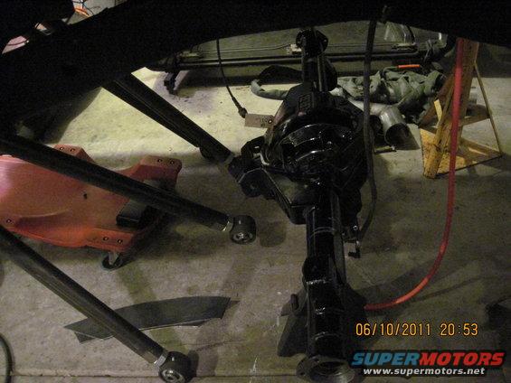 Black rear axle assembly with suspension components