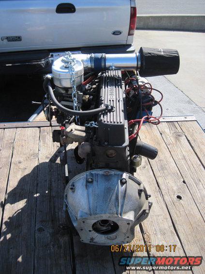 Engine and transmission assembly on a trailer, with air intake and filter