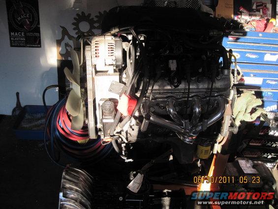Engine with chrome headers and fan