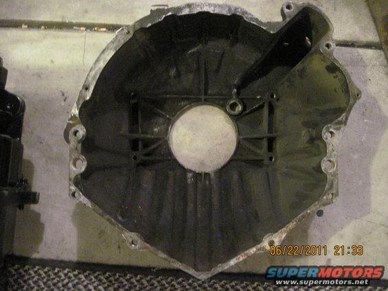 Transmission bell housing, metal, with circular opening and mounting holes