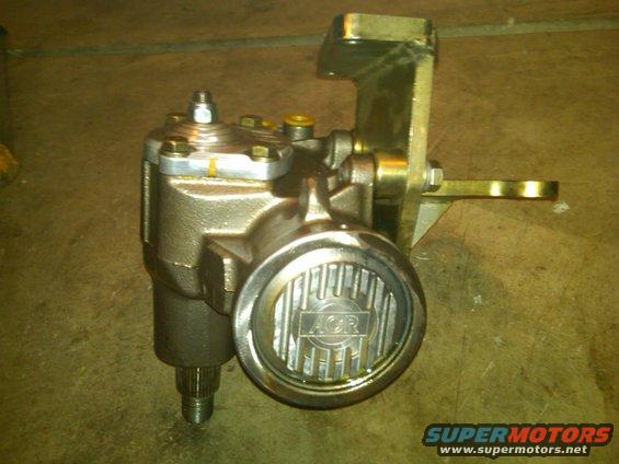 Power steering gearbox with AGR logo on the circular cap