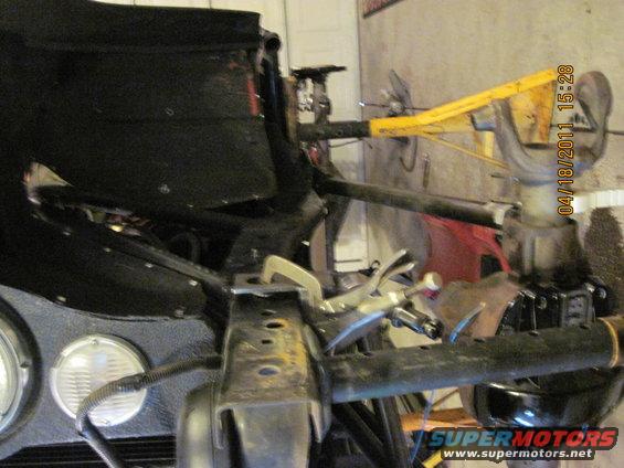 1985 Jeep CJ7 front suspension and frame section with yellow support