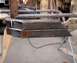 1991 Ford Bronco - A close-up view of a custom bumper being fabricated, held in place by vise grips.