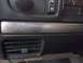 1994 Ford Bronco - Interior view of a 1994 Ford Bronco, showing the dashboard trim and air conditioning vent.
