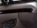 1994 Ford Bronco - Interior door panel of a 1994 Ford Bronco, showing power window and lock controls.