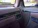 1994 Ford Bronco - The interior of a 1994 Ford Bronco Eddie Bauer shows the dashboard details and door panel.
