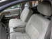 1994 Ford Crown Victoria - Interior view of a car's front seats, light leather upholstery and a Lincoln emblem.