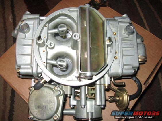 Holley carburetor with "PERFORMANCE" and "PURE" visible on a circular plate