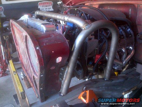 1985 Jeep CJ7 front clip with custom exhaust and engine swap in progress