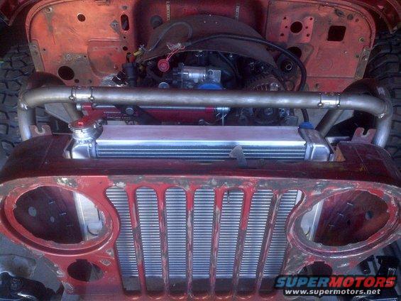 Jeep CJ-series front end with engine and radiator exposed