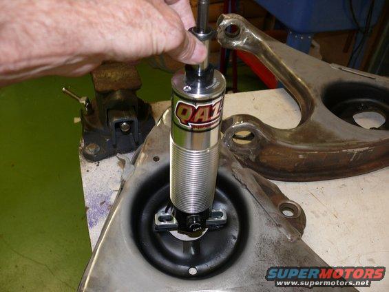 QA1 shock absorber installation on suspension part