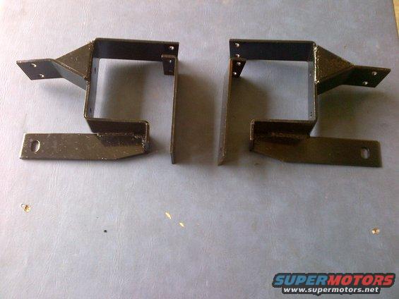 Pair of black metal brackets with mounting holes