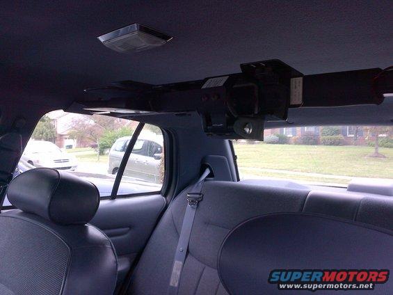 2001 Ford Crown Victoria interior with ceiling-mounted device