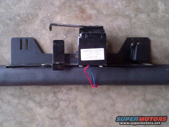 Trailer hitch wiring harness module with red and blue wires attached