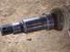 1995 Mercury Grand Marquis - Close-up of a metal spindle, a component of a vehicle's suspension system.