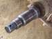 1995 Mercury Grand Marquis - A close-up view of a metal spindle, likely a vehicle part, with visible threading on one end.