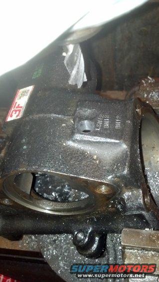 img_20130918_234417_137.jpg Left hand turn pressure port hole milled into the flat spot .  It is VERY thick here, no worries about tapping too deep.