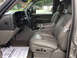 2005 Chevrolet Suburban - Interior view of a truck's cabin, highlighting the driver's seat and dashboard controls.