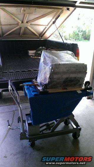 Engine on dolly in pickup truck bed