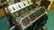2005 Chevrolet Suburban - Close-up view of an engine block's valve train assembly, with rocker arms and springs visible.