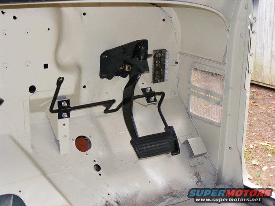 1978 Ford Bronco interior showing pedals and fuse box
