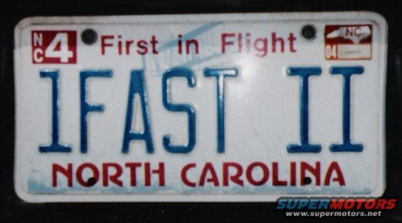 North Carolina license plate reading '1FAST II' with 'First in Flight' and 'North Carolina' text
