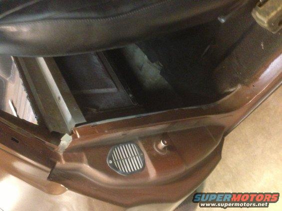 1972 Ford Ranchero interior showing brown door panel and floor vent