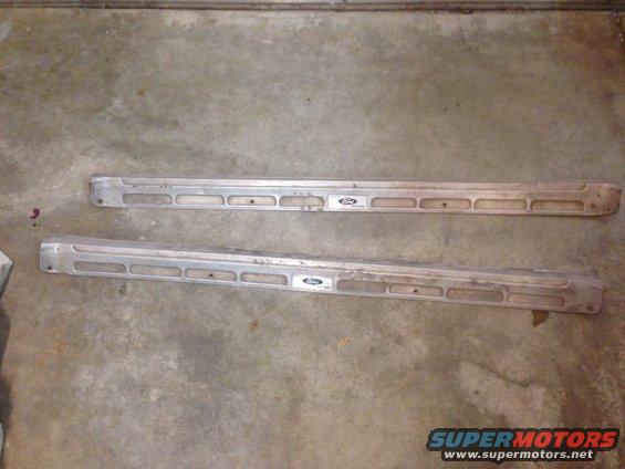 Pair of aluminum running boards with Ford emblems