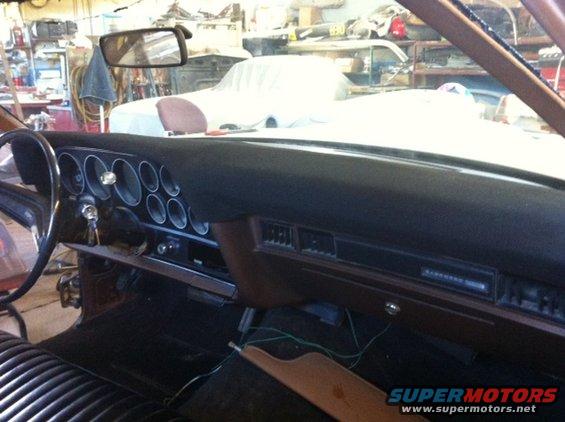 1972 Ford Ranchero interior, brown dashboard with round gauges and black steering wheel