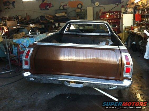 Rear view of a brown 1972 Ford Ranchero in a garage
