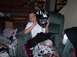 1990 Ford Bronco - A young boy sits in a recliner, holding a motocross helmet, surrounded by Christmas decorations and gifts.