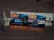 1990 Ford Bronco - The boxes display images of the satellite radio receiver and its mobile dock accessory.