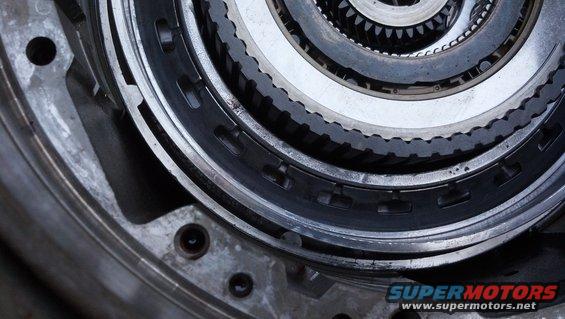 Close-up of stacked clutch plates and gears inside an automatic transmission