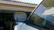 1997 Dodge 3500 - Side mirror assembly on a white 1997 Dodge 3500 truck.