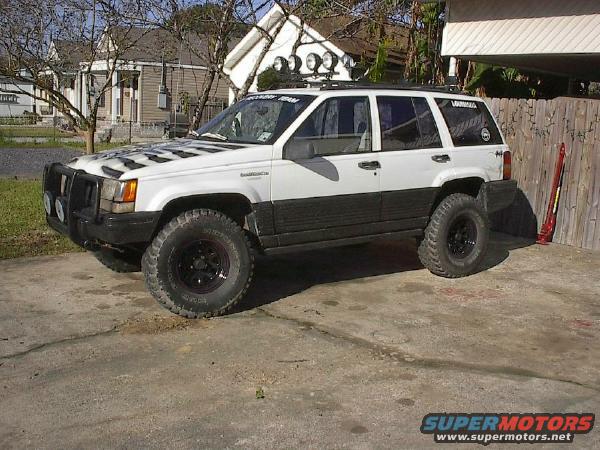 fa55e560.jpg.orig.jpg Drive way shot with new lift and tires..