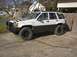 1993 Jeep Grand Cherokee - Drive way shot with new lift and tires..