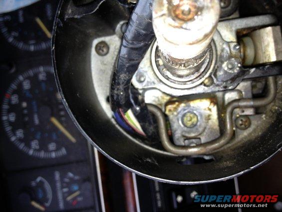 img_1219.jpg  Replace 89 Bronco Turn Signal Switch - Take a look at my Tilt Wheel section - http://www.supermotors.net/registry/15076/71228 - to read how to take wheel off and get at the switch.  This time, take both of the bolts out holding the switch in.  When you wrestle it off, you'll see the wires snaked down the column.  