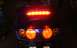 2006 Honda Reflex - Scooter tail lights illuminated, showing brake light and turn signals.