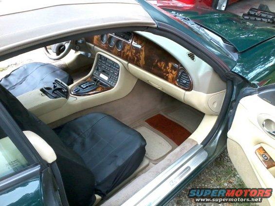 Interior of a Jaguar XK8 showing dashboard, center console, and seats