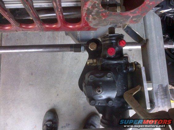 close-up of vehicle steering box and linkage