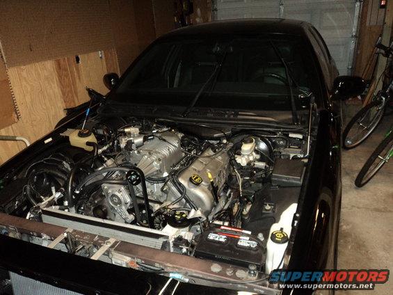 2004 Mercury Grand Marquis engine bay with supercharger installed