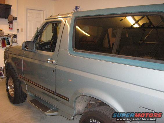1996 Ford Bronco parked in a garage, side view