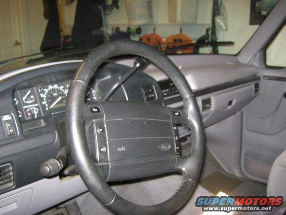 1996 Ford Bronco interior with steering wheel and dashboard