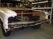 1964 Ford Fairlane - Front view of a 1964 Ford Fairlane undergoing restoration, with its engine and interior partially visible.