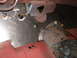 1964 Ford Fairlane - Firewall repair in progress, showing custom metalwork and primer. No specific vehicle year is identifiable.