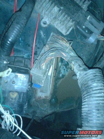 p82a0114.jpg ECM got hit by the tire. broke the plug in half. the steel cover I made to protect it ripped off of the firewall