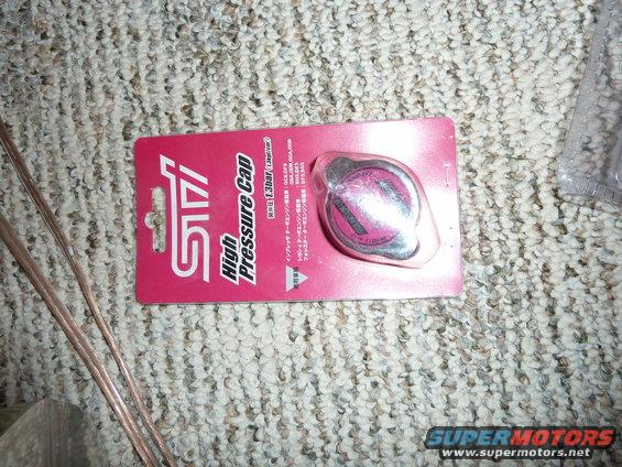STI High Pressure Cap on pink packaging with Japanese text and 1.3bar rating
