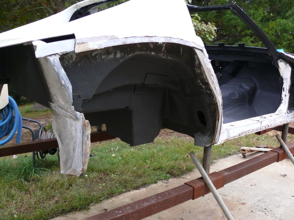 1976 Chevrolet Corvette body, side view, undergoing restoration
